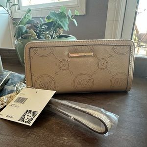 And Klein slim Zip wallet